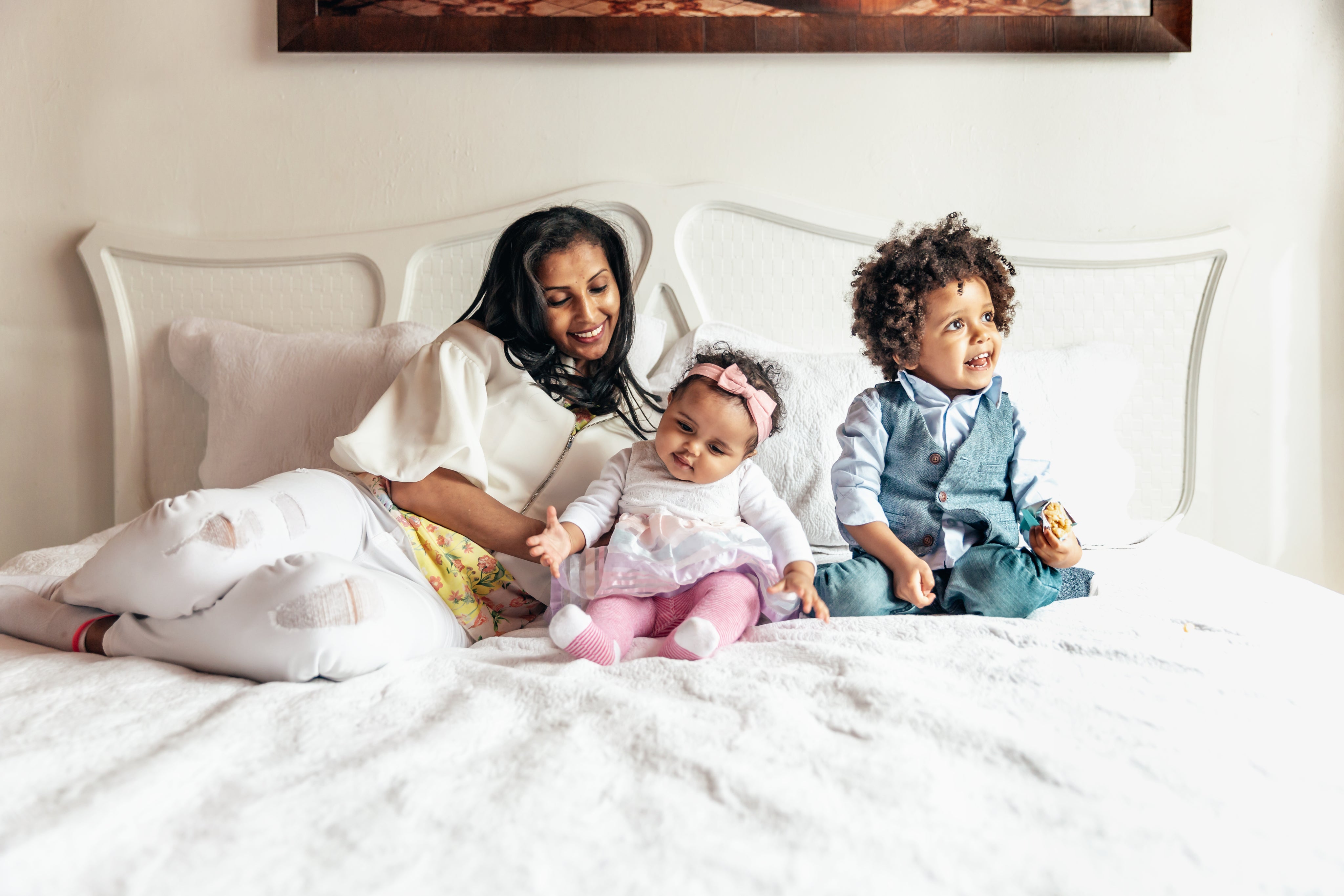 files/mom-with-daughter-and-son-on-bed.jpg